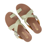 Pair of sandals with beige straps and brown soles on a white background