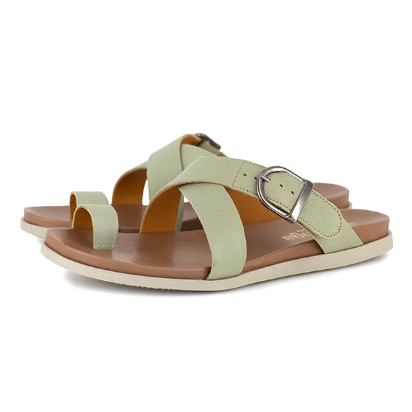 Pair of light green sandals with a brown sole on a white background