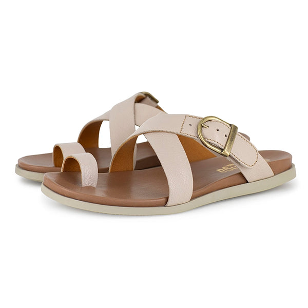 Beige sandals with a gold buckle on a white background