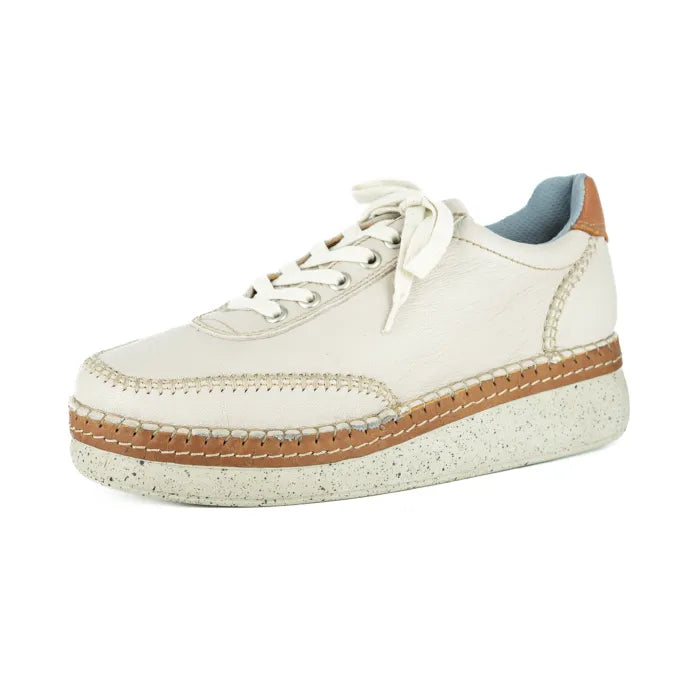 Cream sneaker with brown accents on a white background