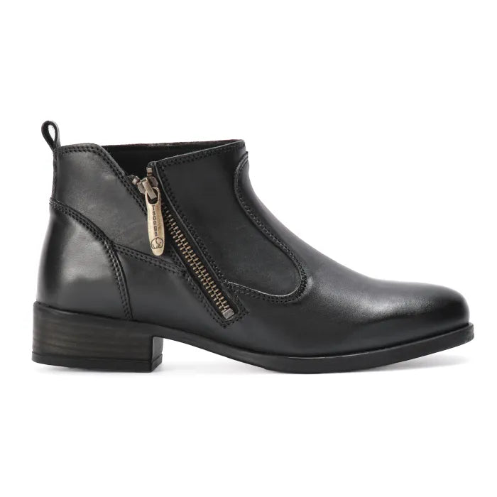 Black ankle boot with a gold zipper on a white background