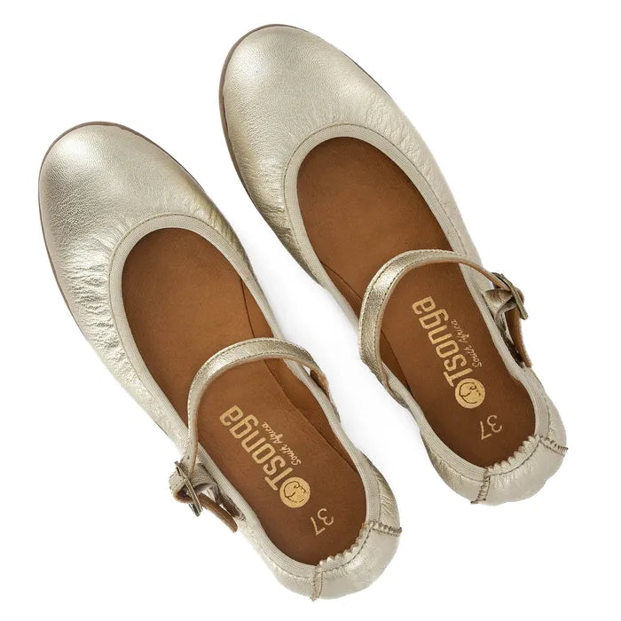Pair of gold flats with 'Tsonga' branding on a white background