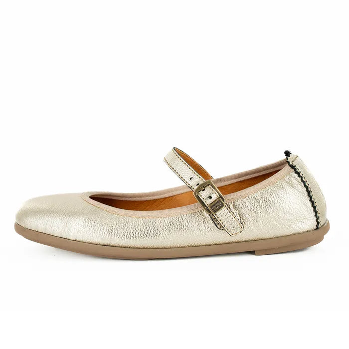 Gold metallic flat pump with a strap on a white background