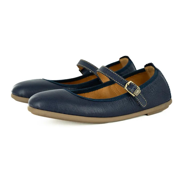 Pair of navy blue pumps with a gold buckle on a white background