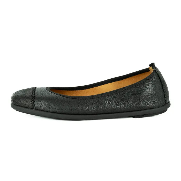 Black leather flat shoe on a white background