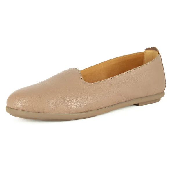 Beige flat shoe on a white background