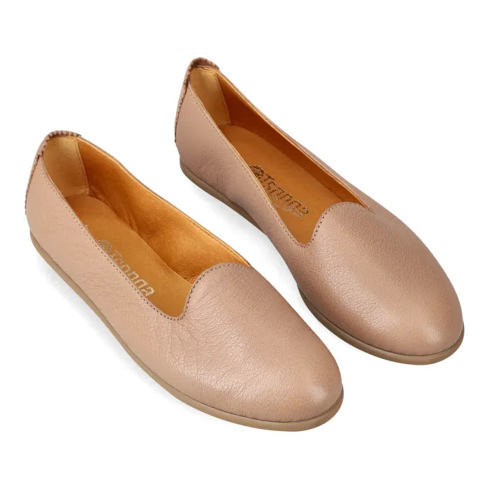 Pair of beige loafers on a white background