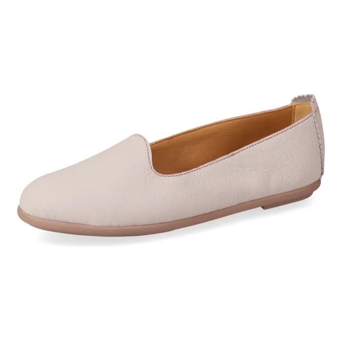 Beige flat shoe on a white background