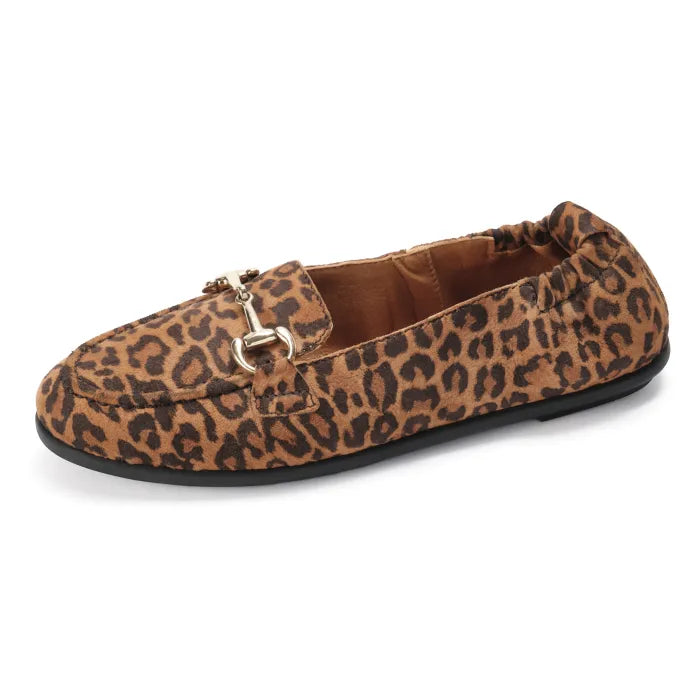 Leopard print loafers with a gold trim on a white background