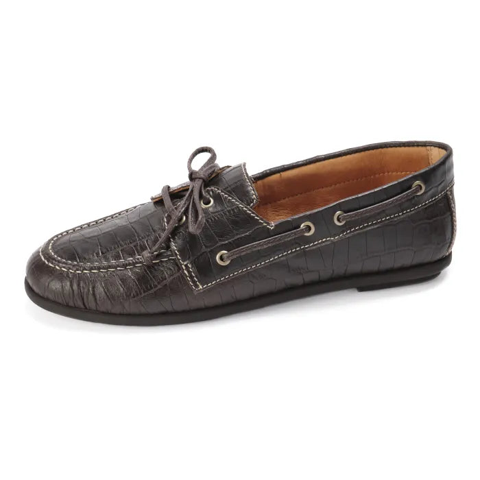Brown leather boat shoe on a white background