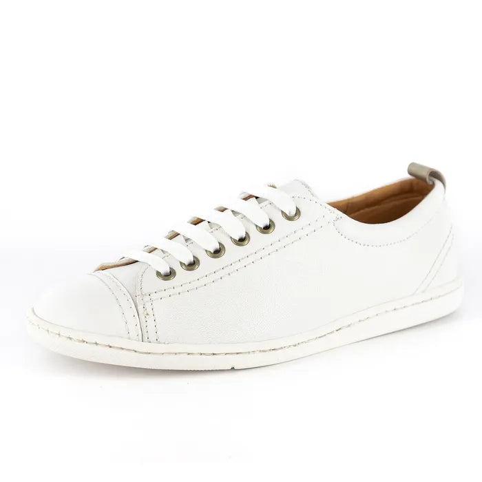 White sneaker with brown lining on a white background