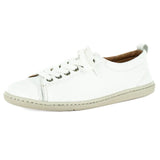 White sneaker with white laces on a white background