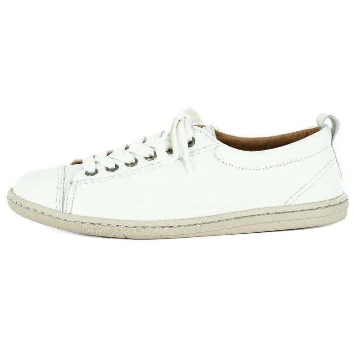 White sneaker with white laces on a white background