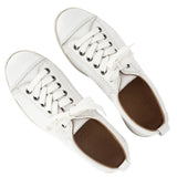 Pair of white sneakers on a white background