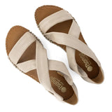 Pair of sandals with braided design on a white background