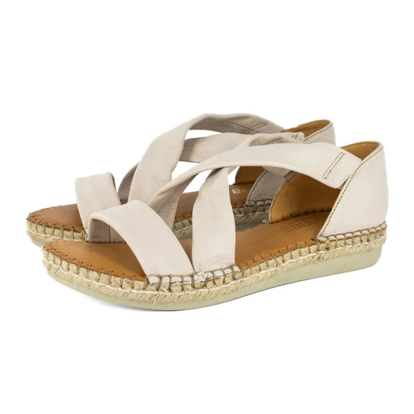 Beige sandal with espadrille sole on a white background