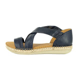 Navy blue sandal with a beige sole on a white background