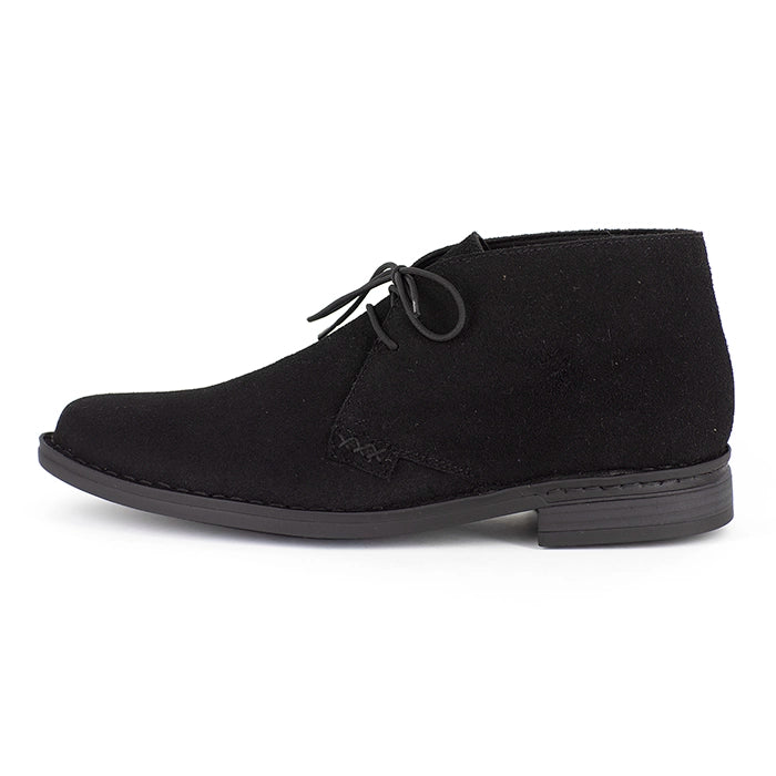 Black suede shoe on a white background