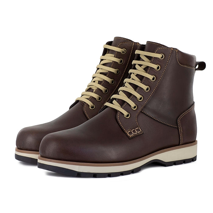 Pair of brown leather boots with beige laces on a white background