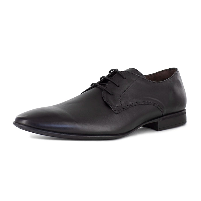 Black leather dress shoe on a white background