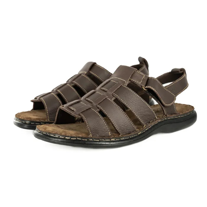 Pair of brown sandals on a white background