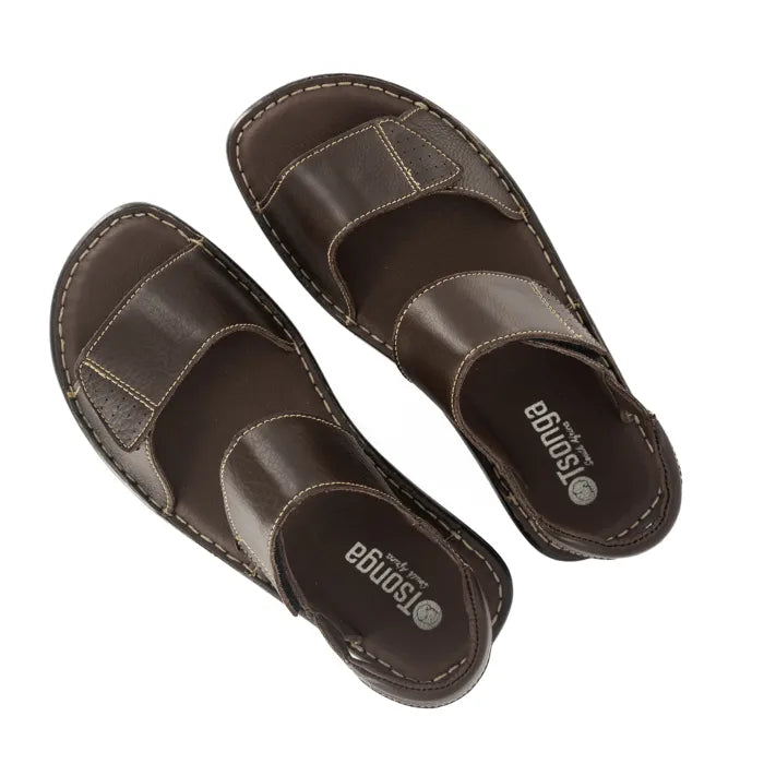 Pair of brown sandals with 'Tsonga' branding on a white background