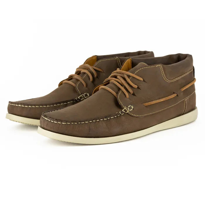 Brown leather shoes with off-white soles on a white background