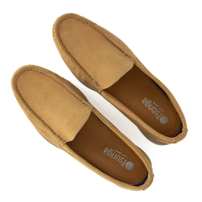 Pair of tan loafers on a white background