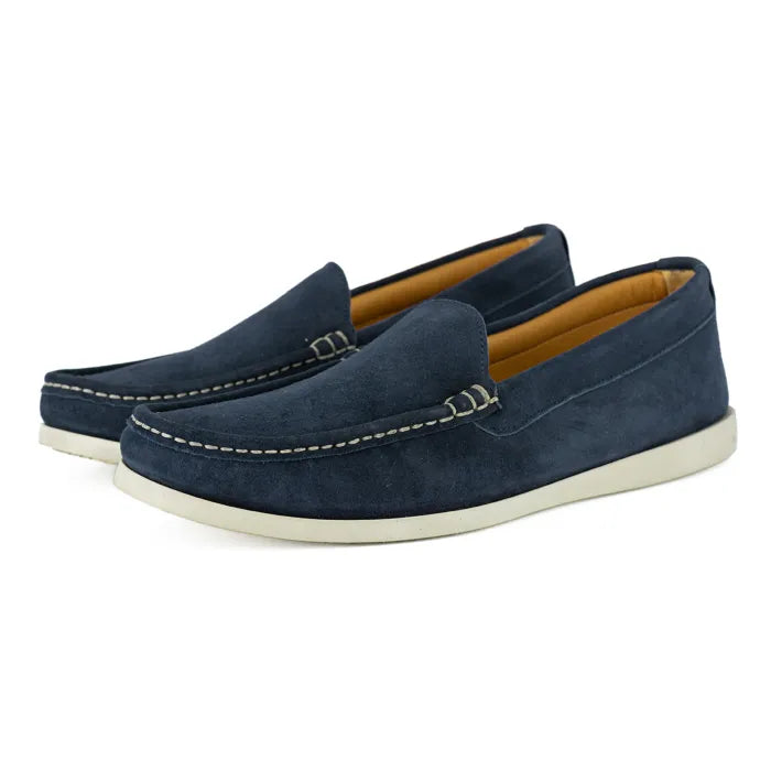 Pair of blue loafers on a white background