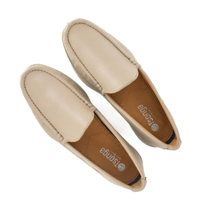 Pair of beige loafers on a white background