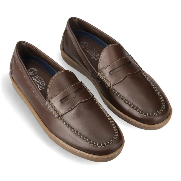 Pair of brown loafers on a white background