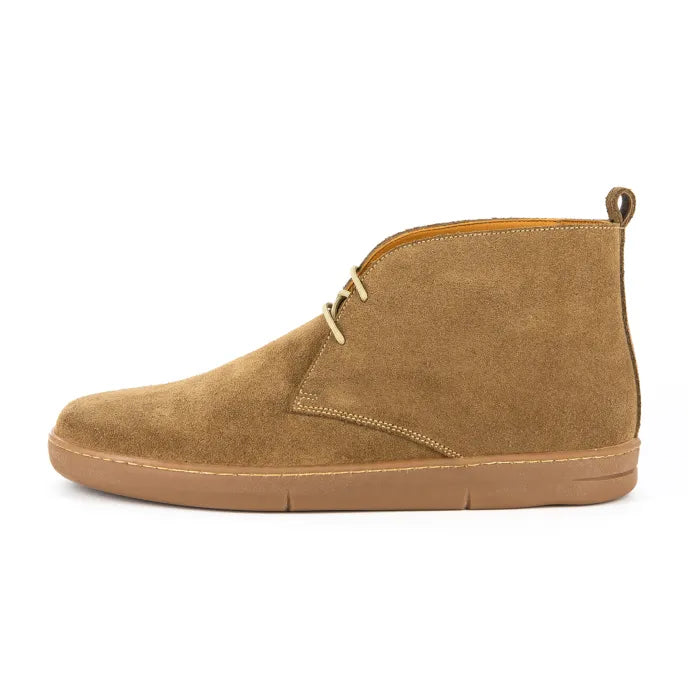 Tan suede shoe on a white background