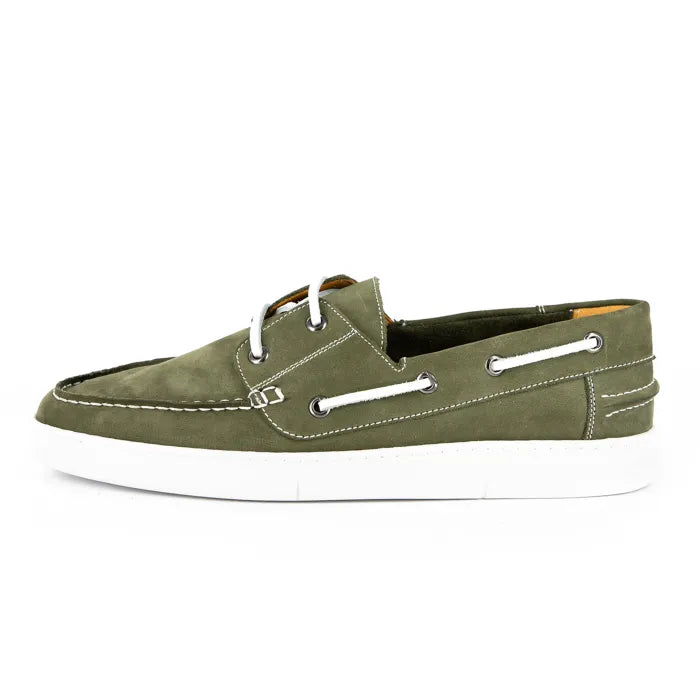 Green suede boat shoe with white accents on a white background