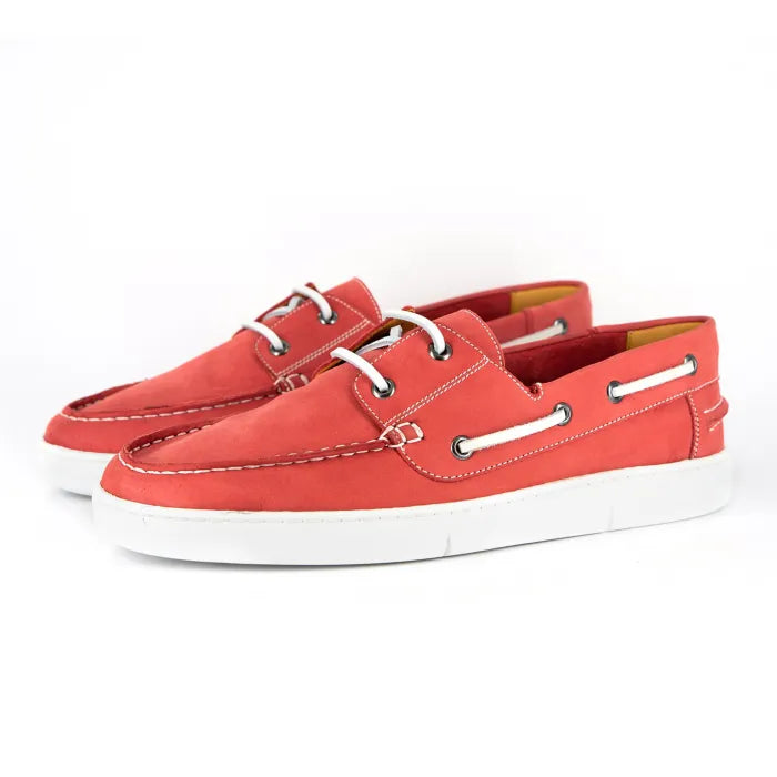 Red casual shoes with white soles on a white background