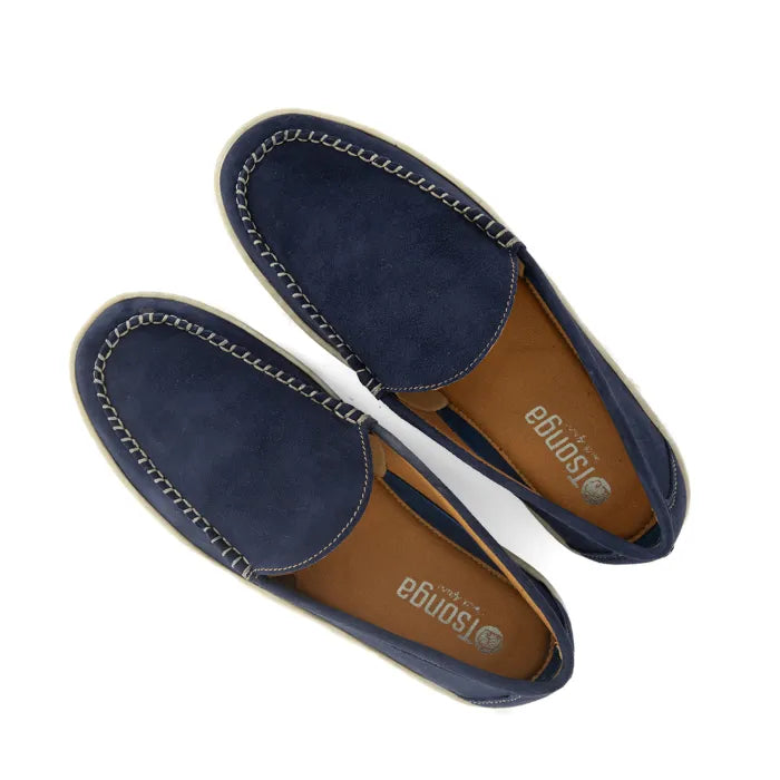 Pair of navy blue loafers with brown soles on a white background