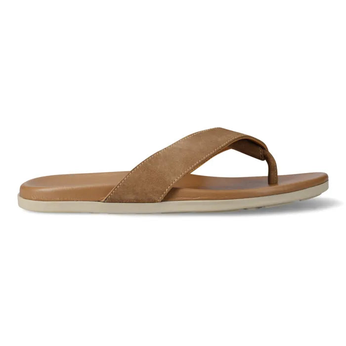 A single tan leather thong sandal with a wide padded strap and a light beige sole, shown in a side profile on a white background.