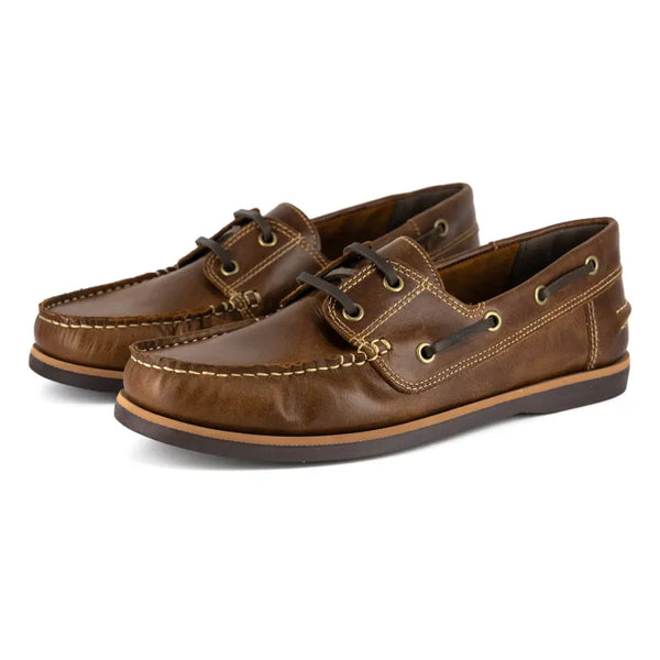 Pair of brown leather boat shoes on a white background