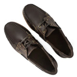 Pair of brown leather shoes on a white background
