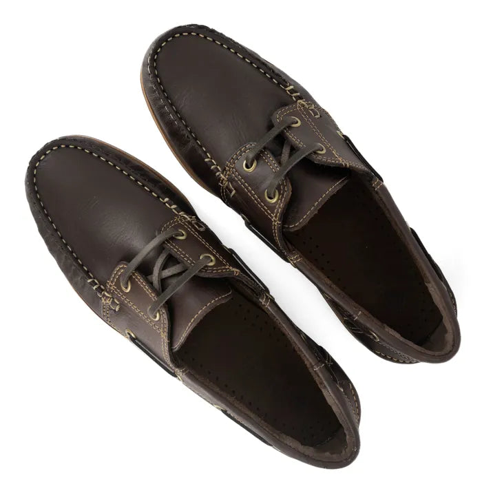 Pair of brown leather shoes on a white background