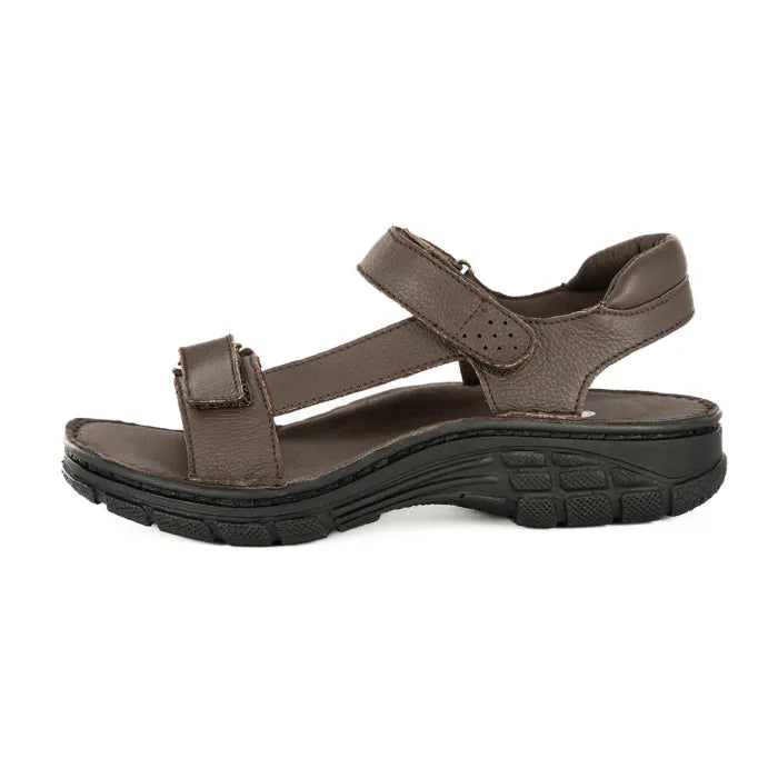 Brown sandal with black sole on a white background