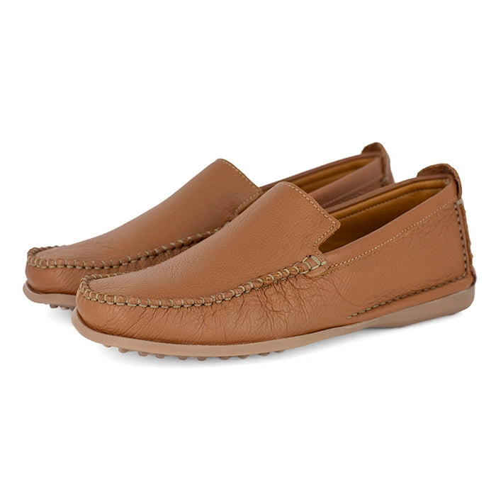 Pair of tan leather loafers on a white background