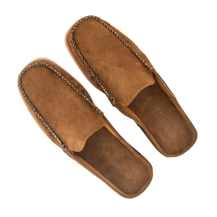 Pair of brown slip-ons on a white background
