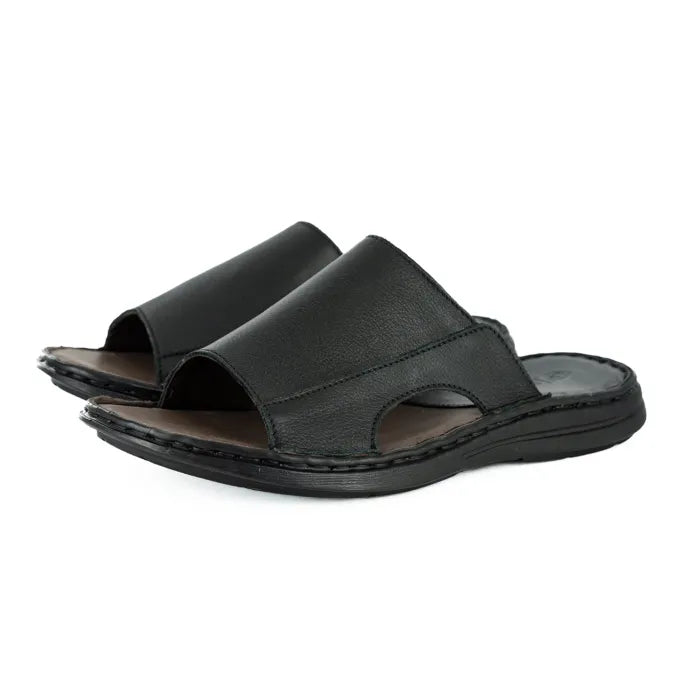 Pair of black sandals on a white background