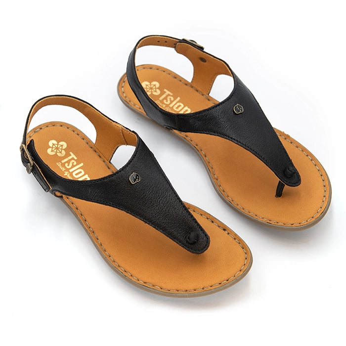 A pair of women's black leather thong sandals with tan footbeds, shown on a clean white background. The brand name 'Tslops' is printed on the footbed.