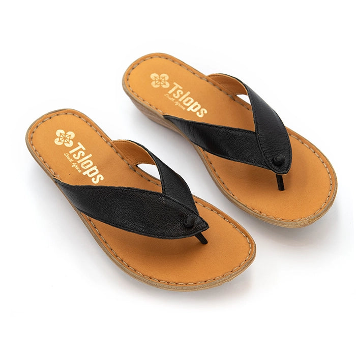A pair of black leather Tslops flip-flop sandals with tan footbeds and a light brown  edge, displayed on a clean white background.