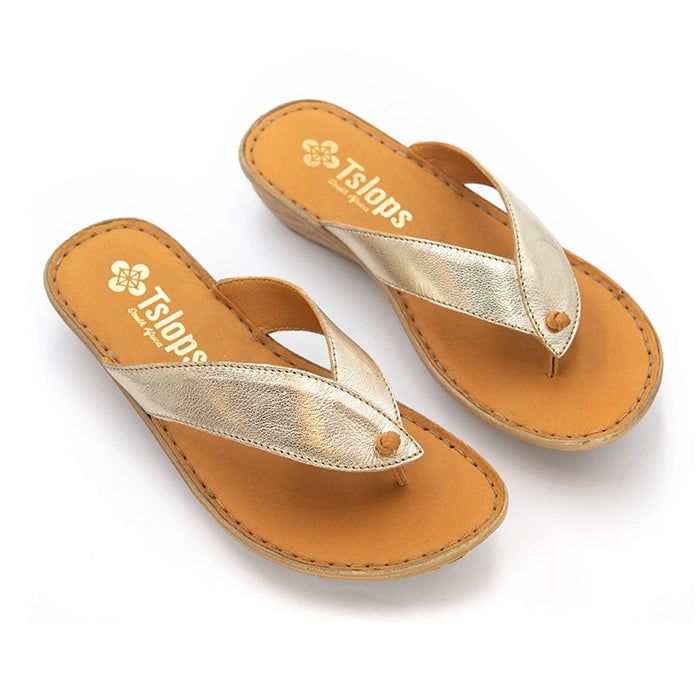 A pair of Tslops metallic gold flip-flop sandals with tan soles, displayed on a clean white background.