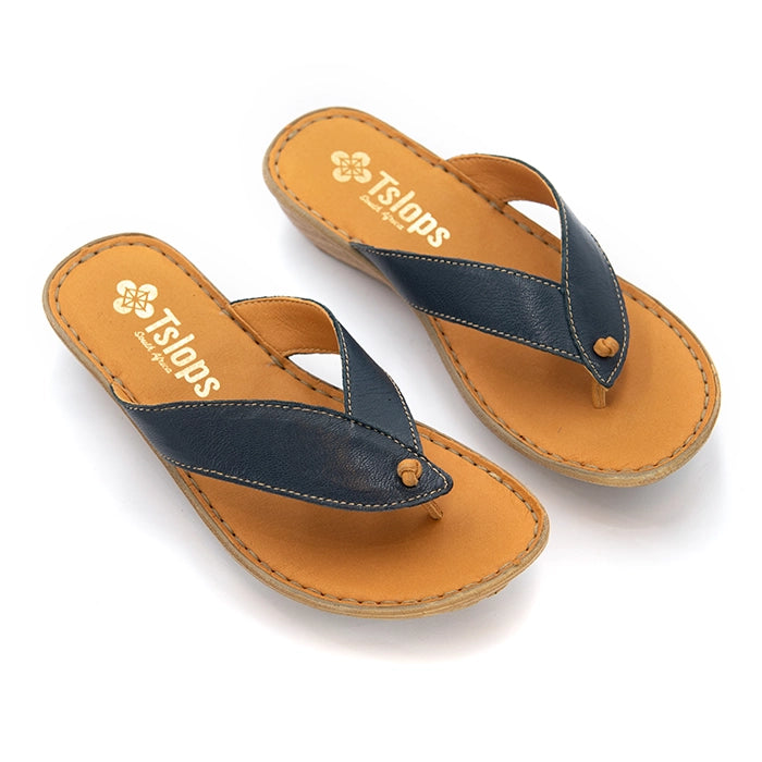 A pair of Tslops flat thong sandals with dark navy blue straps and tan footbeds, displayed on a clean white background.