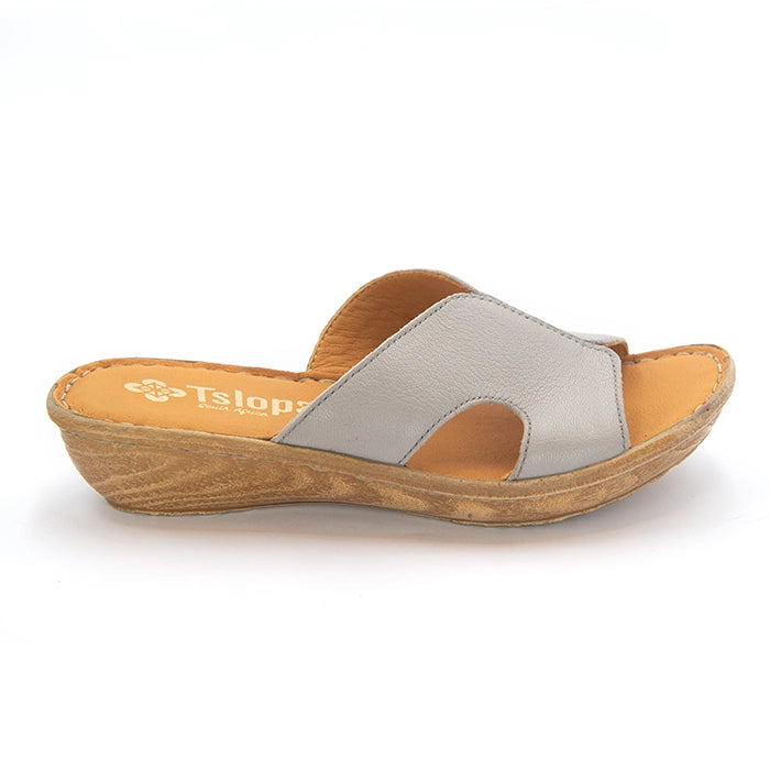 A single women's slide sandal with a light gray leather upper strap, a tan footbed, and a brown wedge heel, shown from a side profile on a white background. The brand name 'Tslops' is visible on the insole.