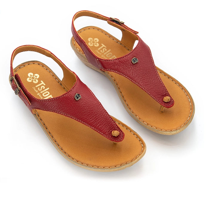 A pair of T-strap sandals with red leather straps and tan footbeds, displayed on a clean white background. The brand name 'Tslops' is visible on the footbed.