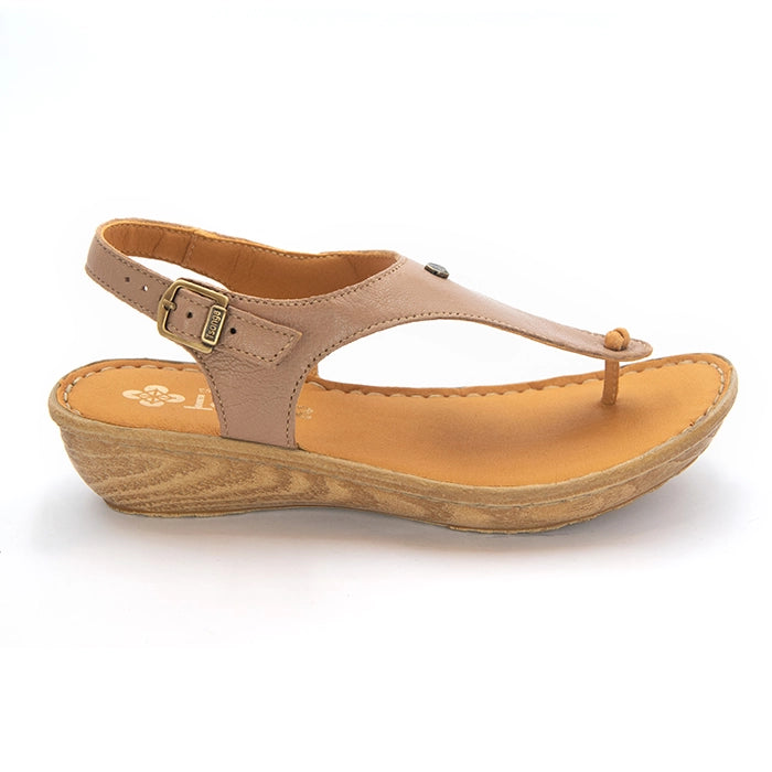 A women's T-strap wedge sandal in beige leather with a brown wedge heel, shown from a side profile on a white background.